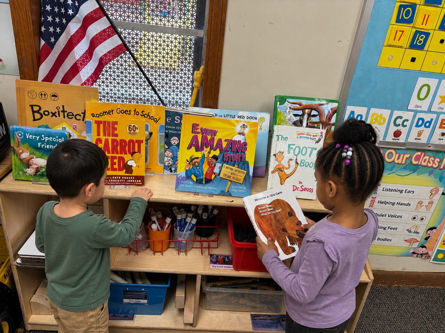 Two Pre-K students reading classic childrens books at Marietta Academy